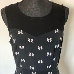Black dress with white ribbon pattern